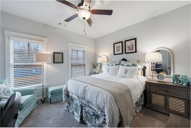 carpeted bedroom featuring ceiling fan