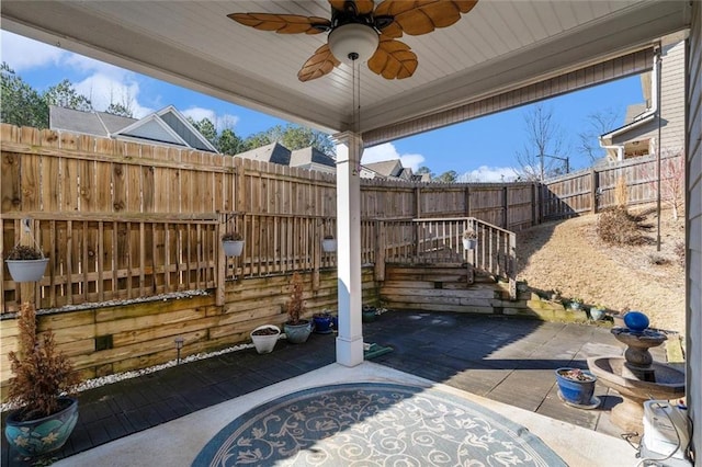 view of patio with ceiling fan