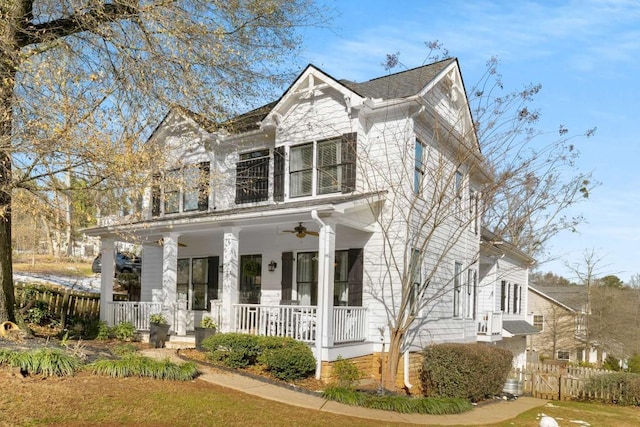 view of front of home with ceiling fan and a porch