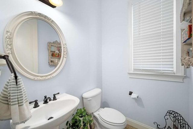 bathroom featuring sink and toilet