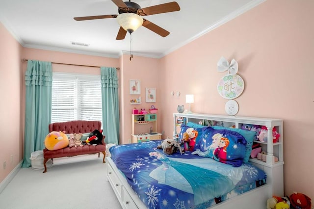 bedroom with ceiling fan, carpet, and crown molding