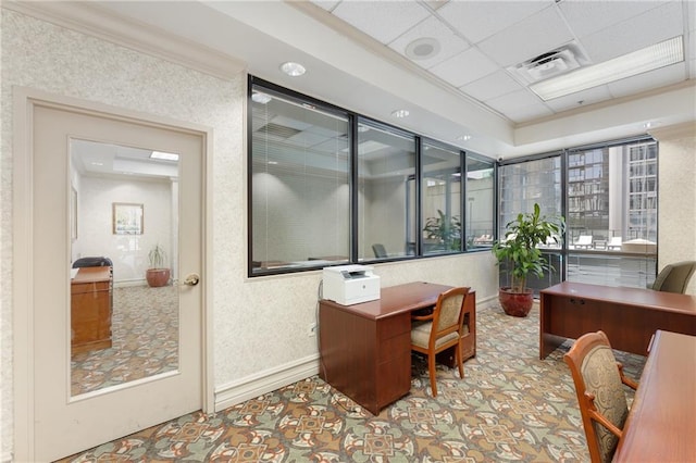 office featuring a paneled ceiling and ornamental molding