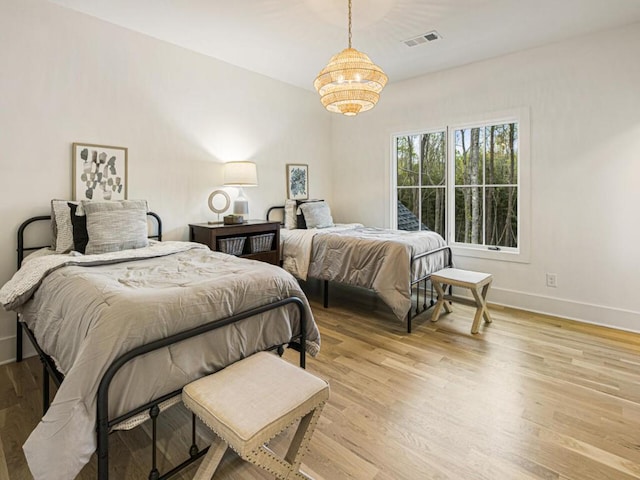 bedroom featuring light wood-type flooring