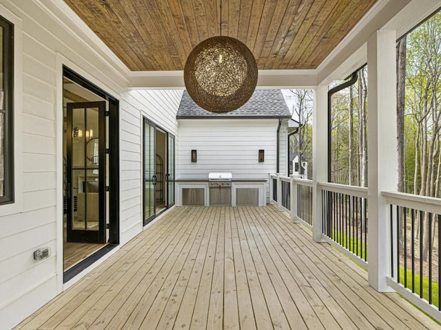 deck with an outdoor kitchen and grilling area