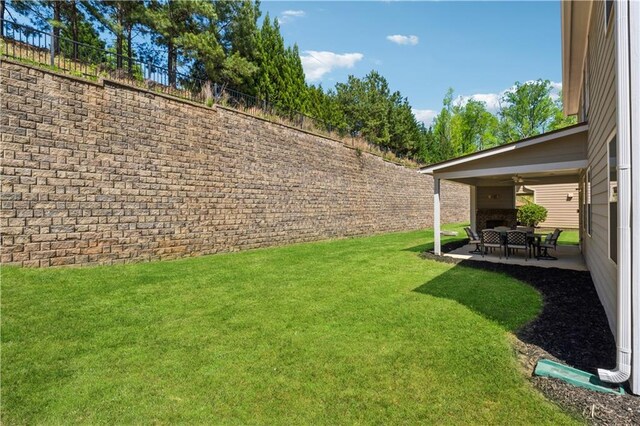 4050 Danbury Farms Dr, Cumming, GA 30040 - view of yard with ceiling fan, fence private yard, and a patio