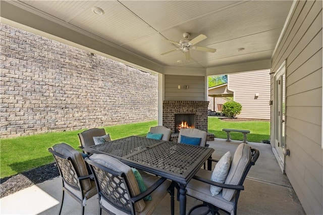 4050 Danbury Farms Dr, Cumming, GA 30040 - view of patio featuring outdoor dining space, an outdoor brick fireplace, and ceiling fan