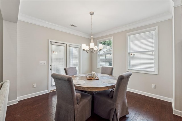 4050 Danbury Farms Dr, Cumming, GA 30040 - dining room with dark wood-style flooring, crown molding, baseboards, and a notable chandelier