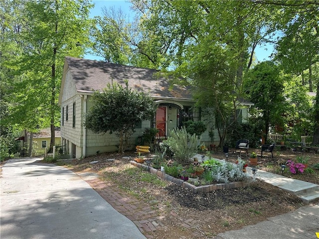 1783 Ridgewood Dr, Atlanta, GA 30307 - view of property hidden behind natural elements with roof with shingles