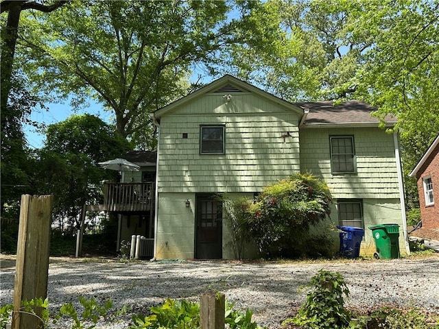 1783 Ridgewood Dr, Atlanta, GA 30307 - view of front of home with a wooden deck and cooling unit