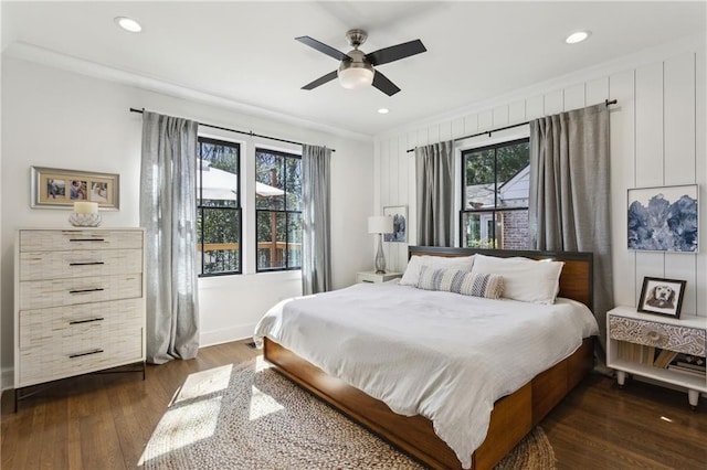 bedroom featuring dark wood finished floors, recessed lighting, a ceiling fan, and ornamental molding