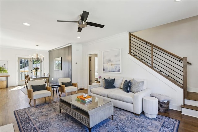 living area featuring recessed lighting, stairway, wood finished floors, and crown molding