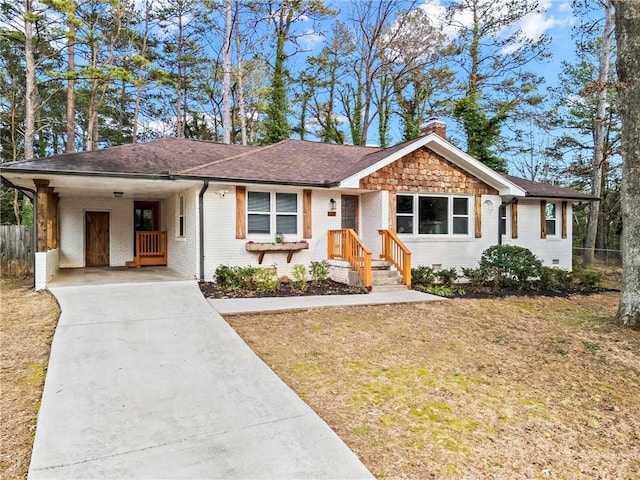 ranch-style house with brick siding, fence, driveway, crawl space, and a chimney