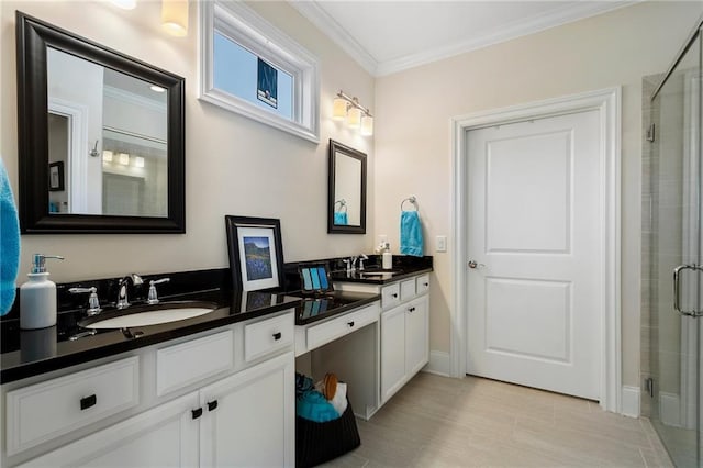 bathroom featuring a shower with door, crown molding, and vanity