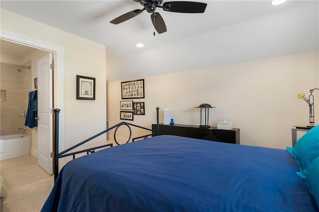 carpeted bedroom featuring connected bathroom and ceiling fan