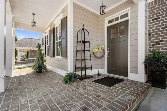 entrance to property with a porch