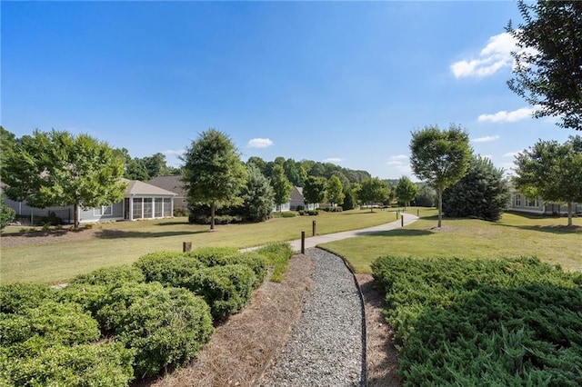 back of house with a patio area, ceiling fan, a lawn, and outdoor lounge area