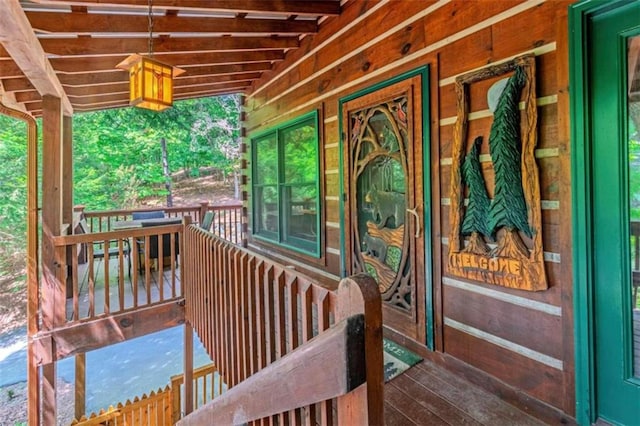 wooden terrace with covered porch