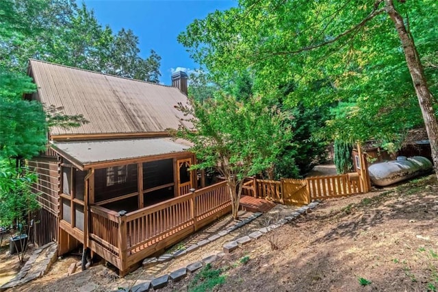 rear view of house with a deck