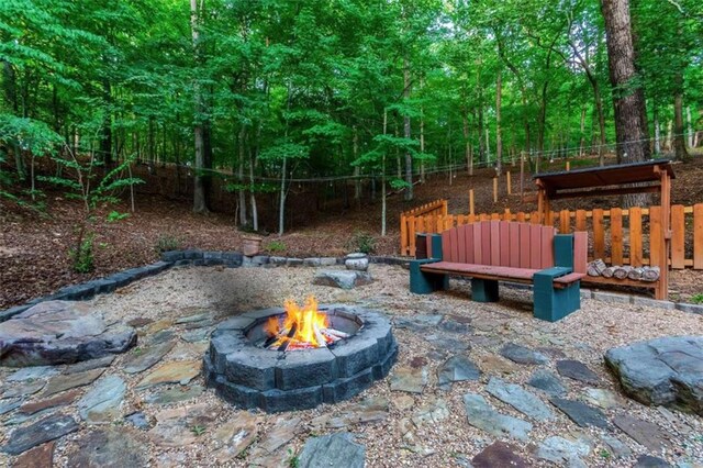 view of yard featuring a fire pit