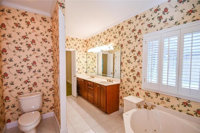 bathroom with vanity, crown molding, a bath, tile patterned flooring, and toilet