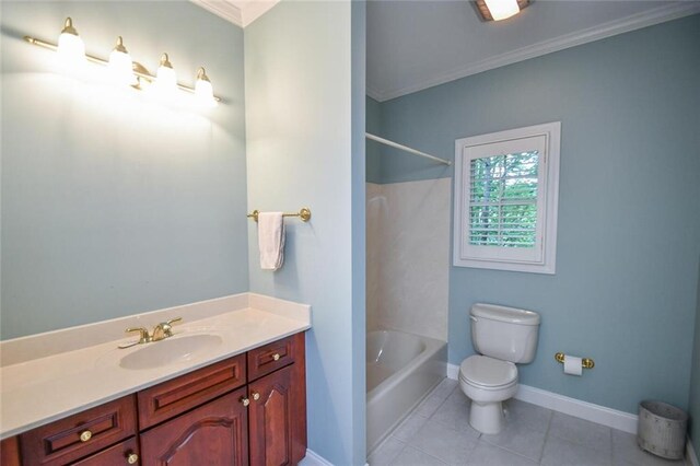 full bathroom featuring tile patterned flooring, crown molding, shower / bath combination, toilet, and vanity