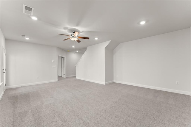 unfurnished room with recessed lighting, baseboards, visible vents, light carpet, and ceiling fan