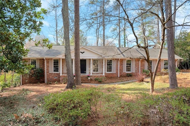 ranch-style house with brick siding