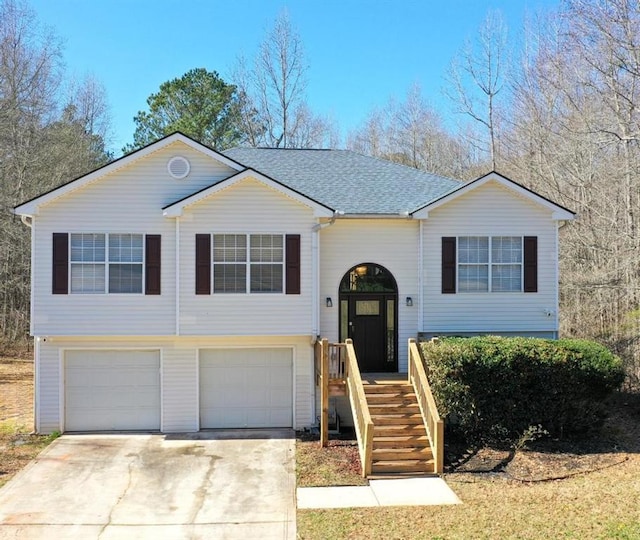 raised ranch featuring a garage