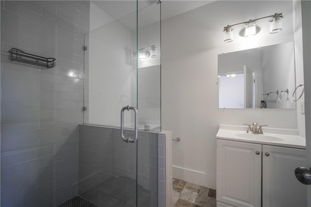 bathroom with vanity and an enclosed shower