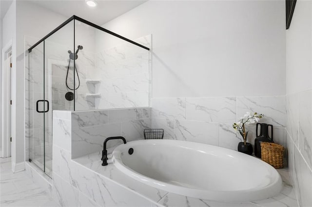 full bathroom featuring a bath, recessed lighting, a marble finish shower, and marble finish floor