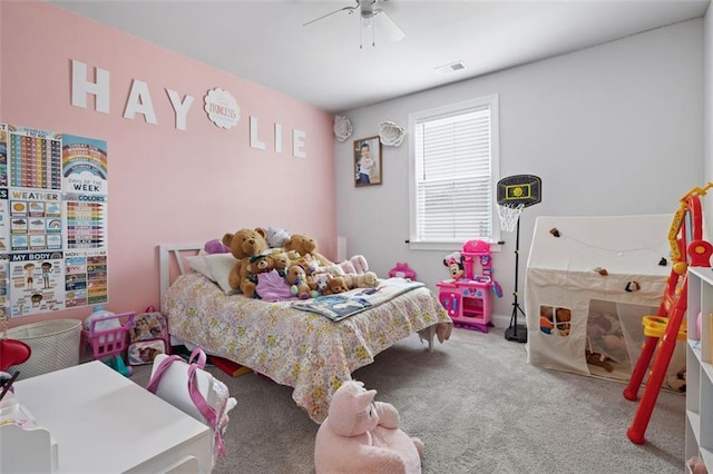 bedroom featuring a ceiling fan, carpet, and visible vents