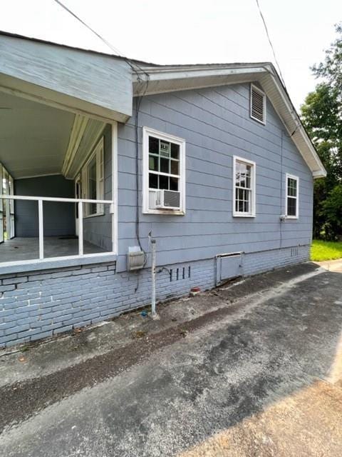 view of side of property featuring crawl space