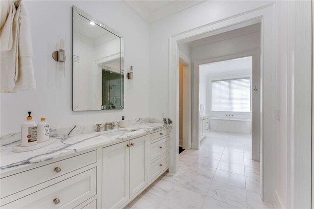 3773 Randall Rd SE, Atlanta, GA 30339 - bathroom with marble look tiles, vanity, and a bathtub