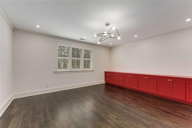 3773 Randall Rd SE, Atlanta, GA 30339 - spare room featuring ornamental molding, a chandelier, dark wood-style flooring, baseboards, and recessed lighting