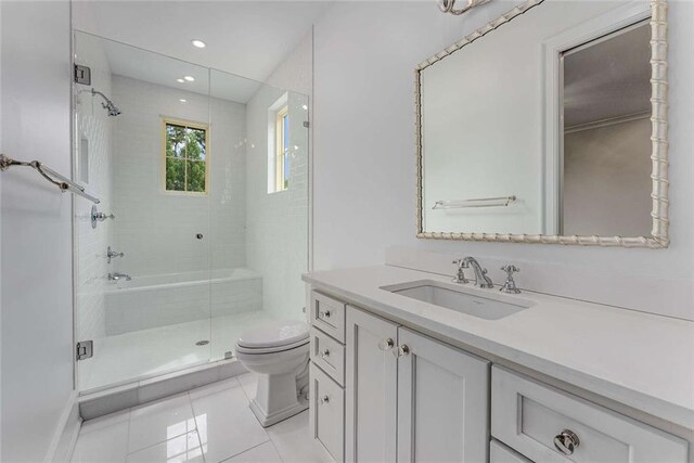 3773 Randall Rd SE, Atlanta, GA 30339 - bathroom featuring a stall shower, toilet, vanity, tile patterned floors, and recessed lighting
