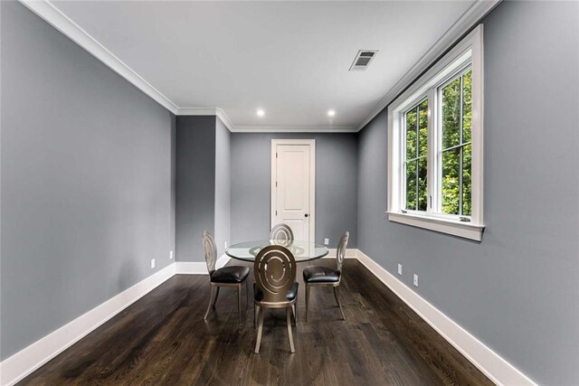 3773 Randall Rd SE, Atlanta, GA 30339 - dining area with dark wood-style flooring, baseboards, ornamental molding, and recessed lighting