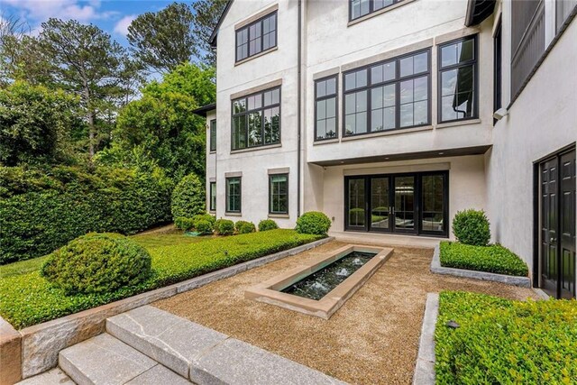3773 Randall Rd SE, Atlanta, GA 30339 - rear view of house with stucco siding