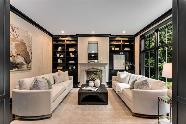 3773 Randall Rd SE, Atlanta, GA 30339 - living room with crown molding, built in shelves, a fireplace, and recessed lighting