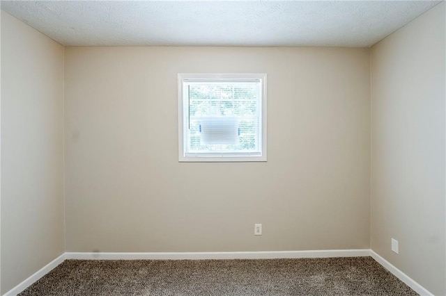 270 Hunt Ridge Dr, Stockbridge, GA 30281 - unfurnished bedroom with dark wood-style floors, baseboards, a closet, and a textured ceiling