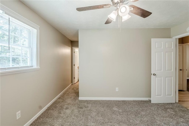 270 Hunt Ridge Dr, Stockbridge, GA 30281 - bedroom with carpet floors, baseboards, and ceiling fan