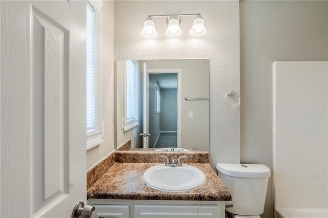 270 Hunt Ridge Dr, Stockbridge, GA 30281 - unfurnished bedroom with carpet, baseboards, and a ceiling fan