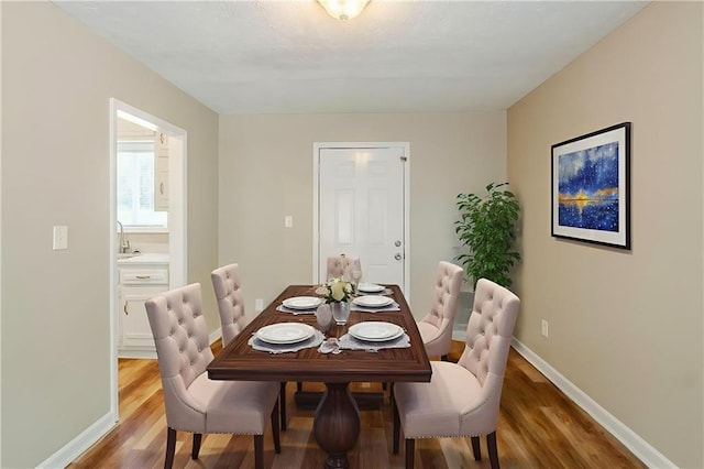 270 Hunt Ridge Dr, Stockbridge, GA 30281 - dining area featuring wood finished floors and baseboards