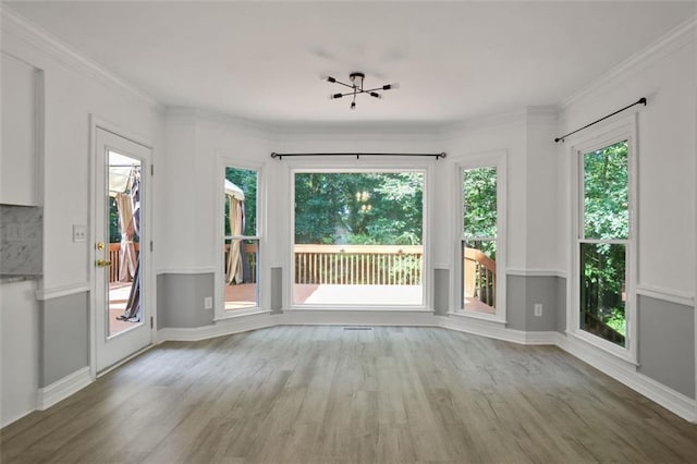 2316 Fripp Overlook NW, Acworth, GA 30101 - unfurnished room with wood finished floors and ornamental molding
