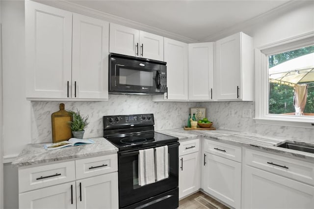 2316 Fripp Overlook NW, Acworth, GA 30101 - kitchen featuring black appliances, white cabinets, tasteful backsplash, light stone counters, and ornamental molding