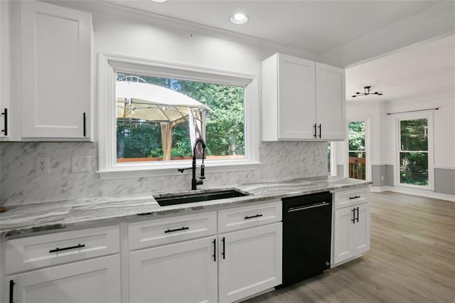 2316 Fripp Overlook NW, Acworth, GA 30101 - kitchen with dishwasher, crown molding, white cabinetry, light wood-type flooring, and tasteful backsplash