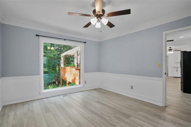 2316 Fripp Overlook NW, Acworth, GA 30101 - unfurnished room with ceiling fan, wood finished floors, wainscoting, and ornamental molding