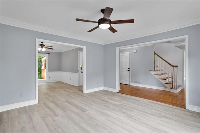 2316 Fripp Overlook NW, Acworth, GA 30101 - unfurnished room with stairs, wood finished floors, a ceiling fan, and crown molding