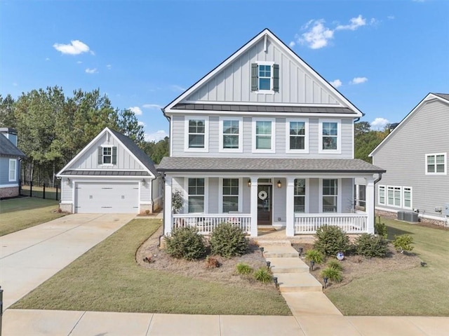 view of front of house with central AC, a porch, and a front lawn