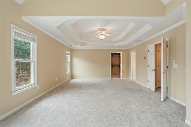 2802 Arabian Trl NE, Marietta, GA 30062 - empty room featuring crown molding, a raised ceiling, light carpet, ceiling fan, and baseboards