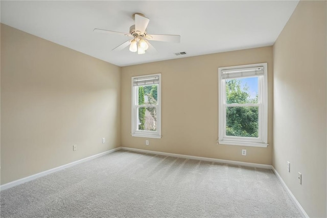 2802 Arabian Trl NE, Marietta, GA 30062 - carpeted spare room with baseboards and ceiling fan